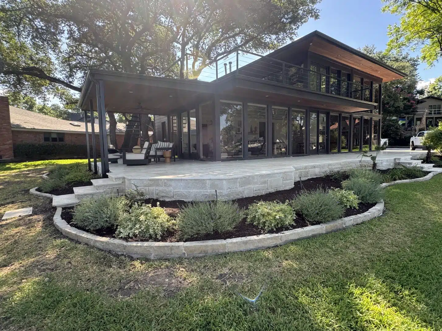 Moden looking front porch with marble tiling house landscape.webp