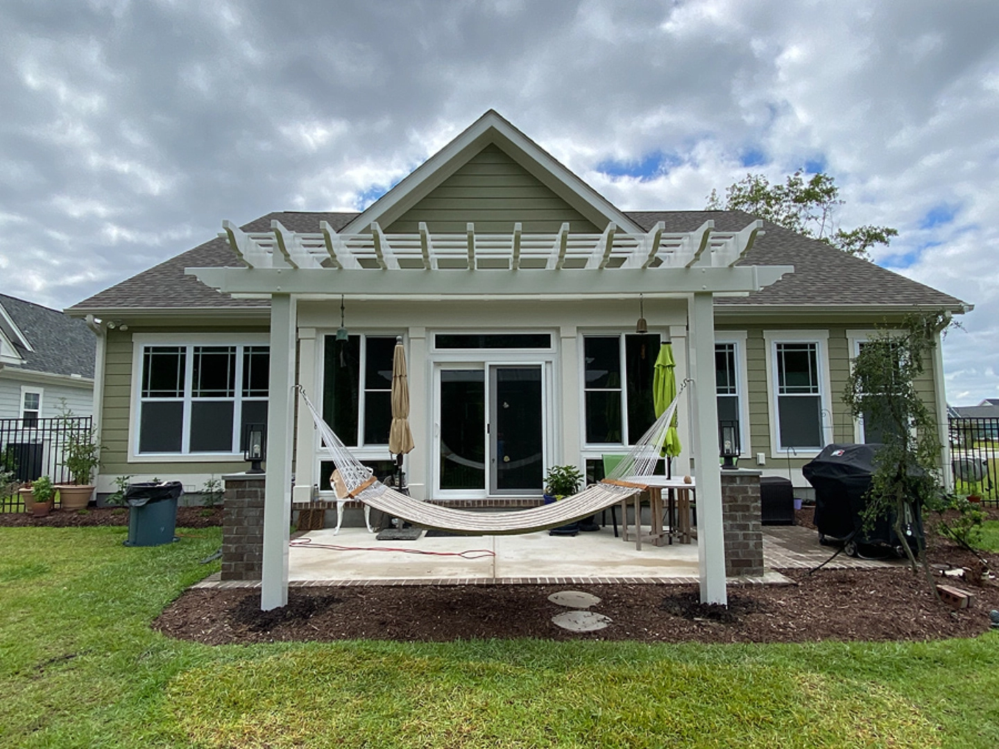 Outdoor pergola living area