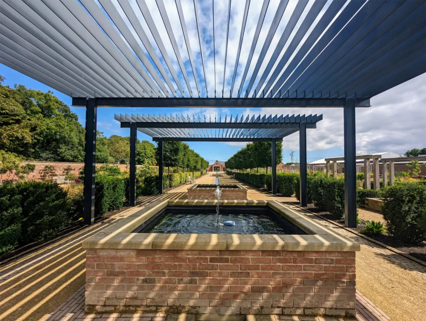 Stock Elegant Garden Louvered Pergola