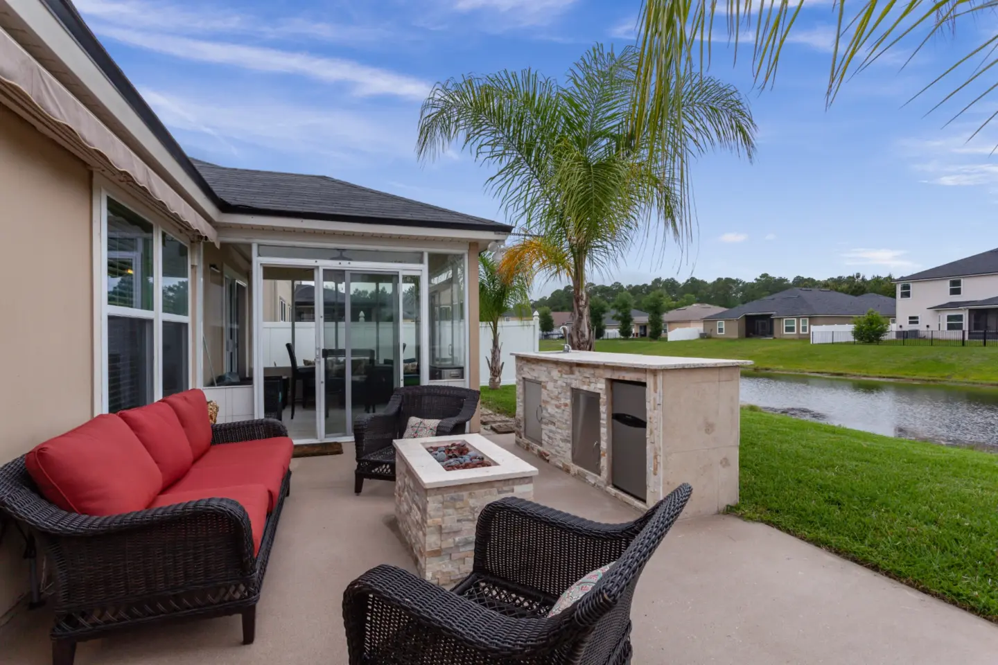 Stock Florida home with an outdoor kitchen