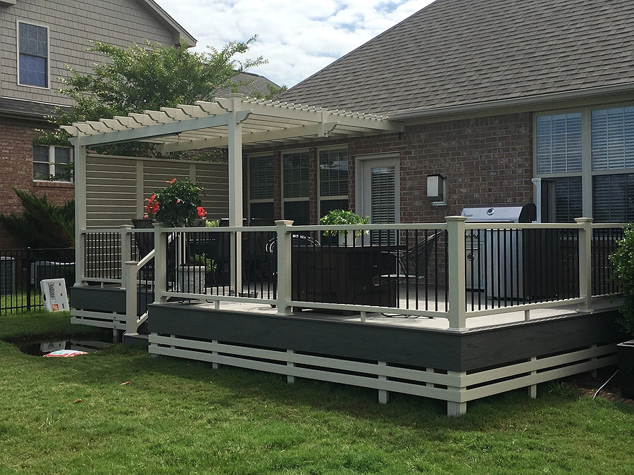 Wood deck railing installation with pergola